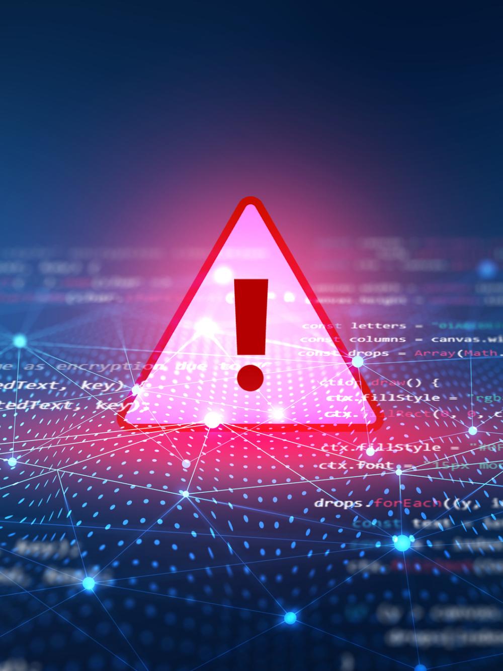 Cybersecurity Warning Alert with Digital Code and Network Connections. A digital cybersecurity warning icon with an exclamation mark, displayed over computer code and connected network nodes, symbolizing data security threats and online risk alerts.