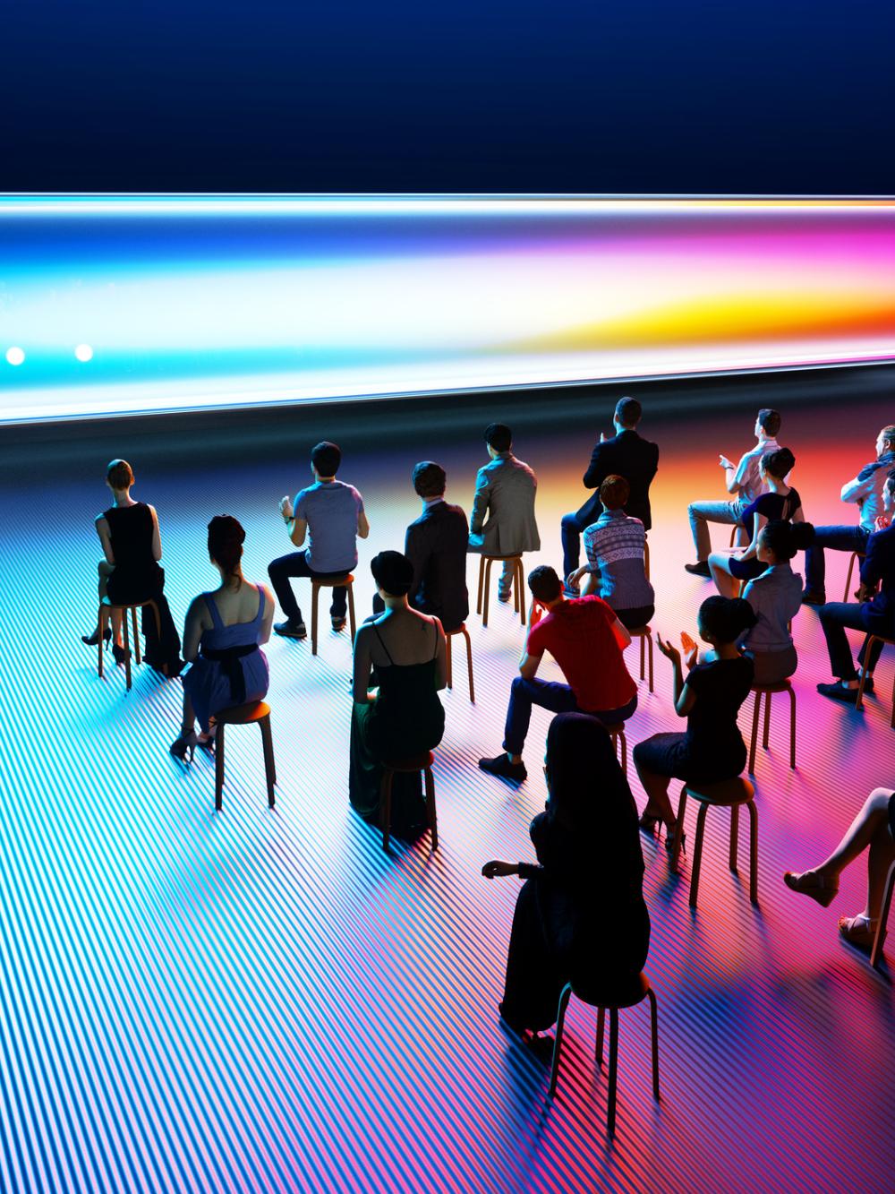 Digital generated image of small group of people sitting on chairs in dark empty space and and being interviewed by large scaled illuminating multi colored AI search bar.